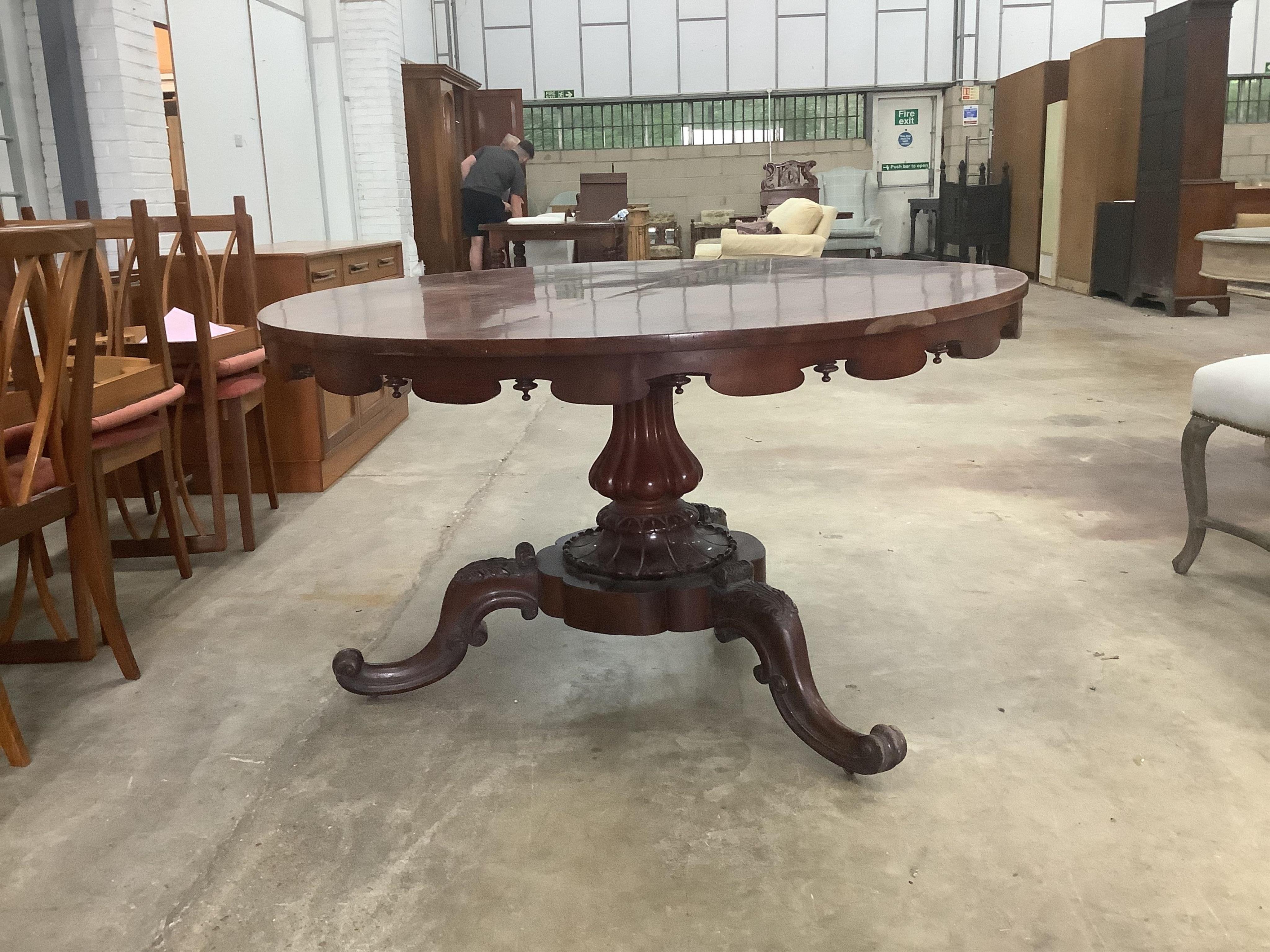 An early Victorian circular mahogany breakfast table, diameter 128cm, height 74cm. Condition - good
